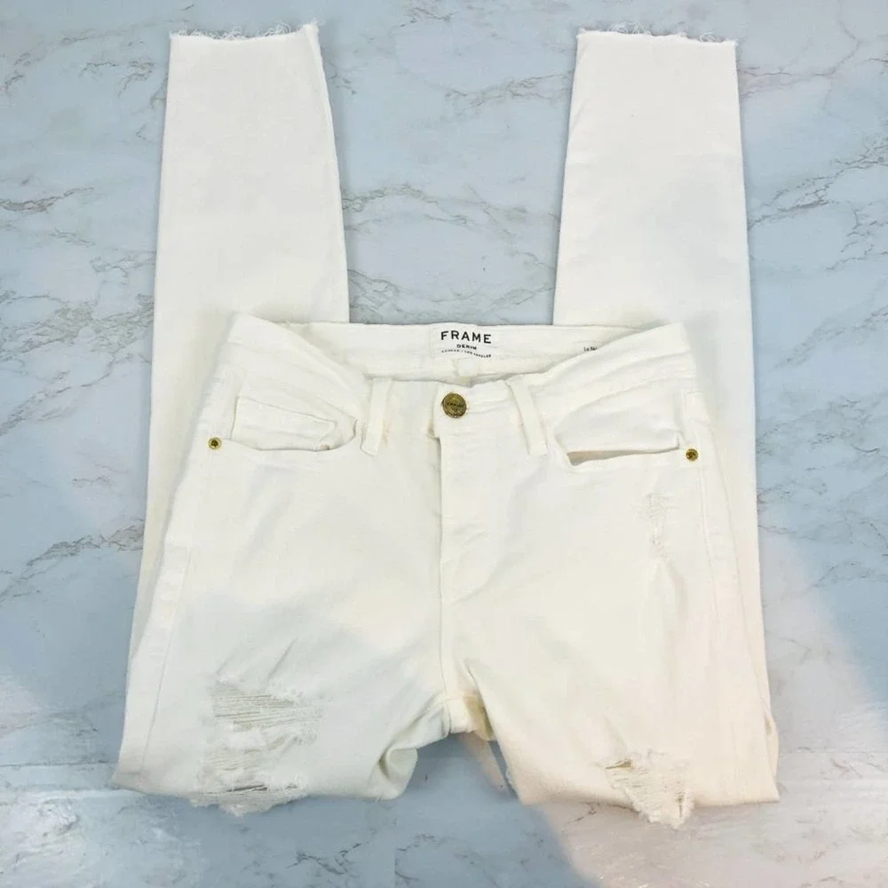 NWOT FRAME LE SKINNY DE JEANNE DISTRESSED RAW HEM JEAN 27